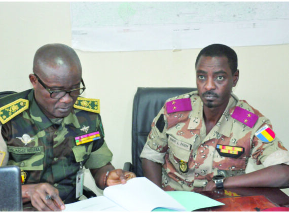 The Deputy Force Commander Brigadier Gereral Mellingui Noumah (Cameroon) hands over to Incoming Deputy Force Commander Brigadier General Bokhit Abdelkarim Gouni (Chad)